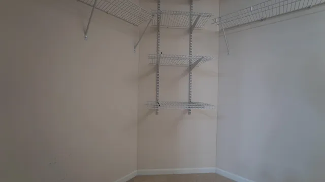 a view of a room with racks on the wall