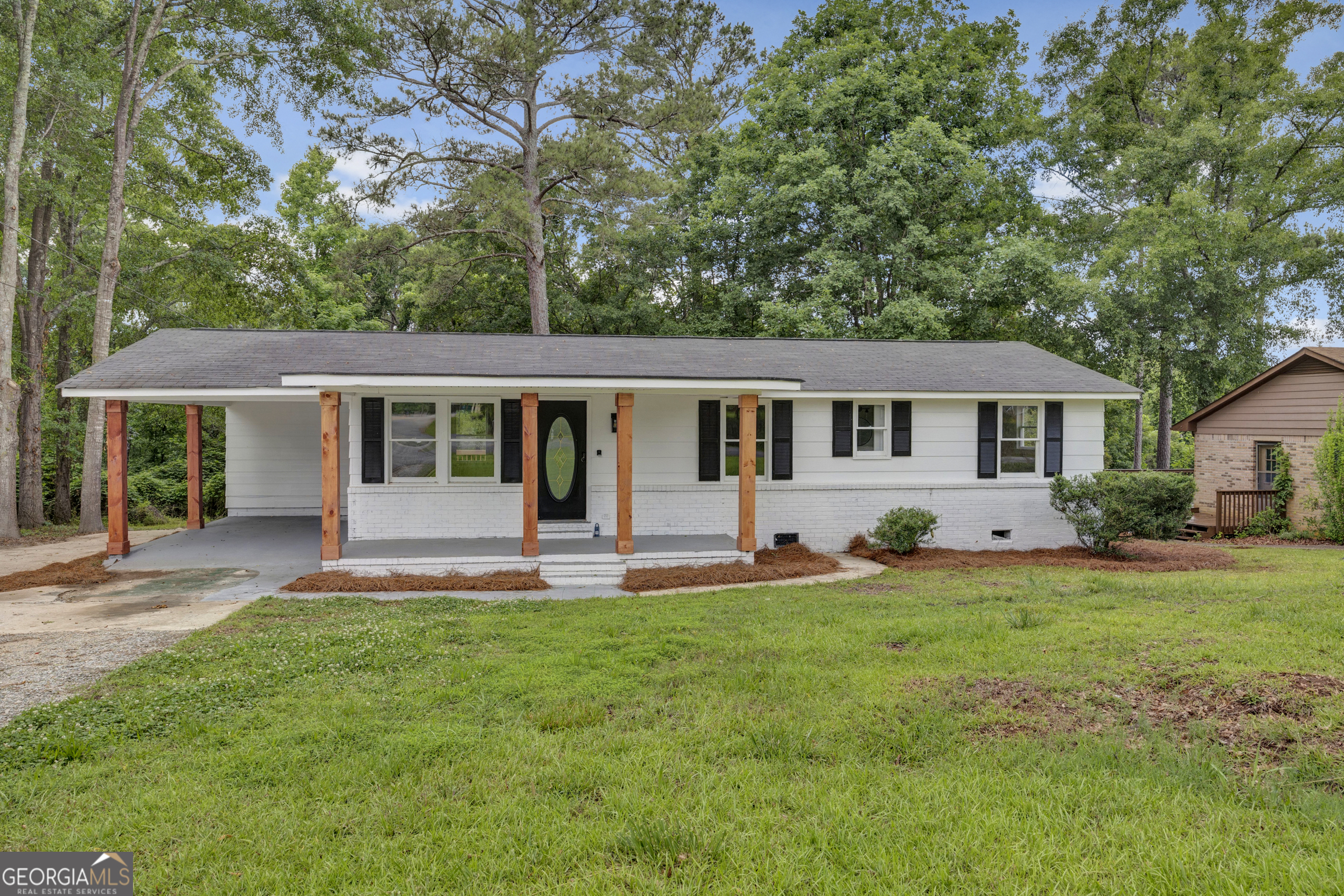 455 Cindy Street Jackson, GA 30233 - Photo 1 of 25 front view of a house with a yard