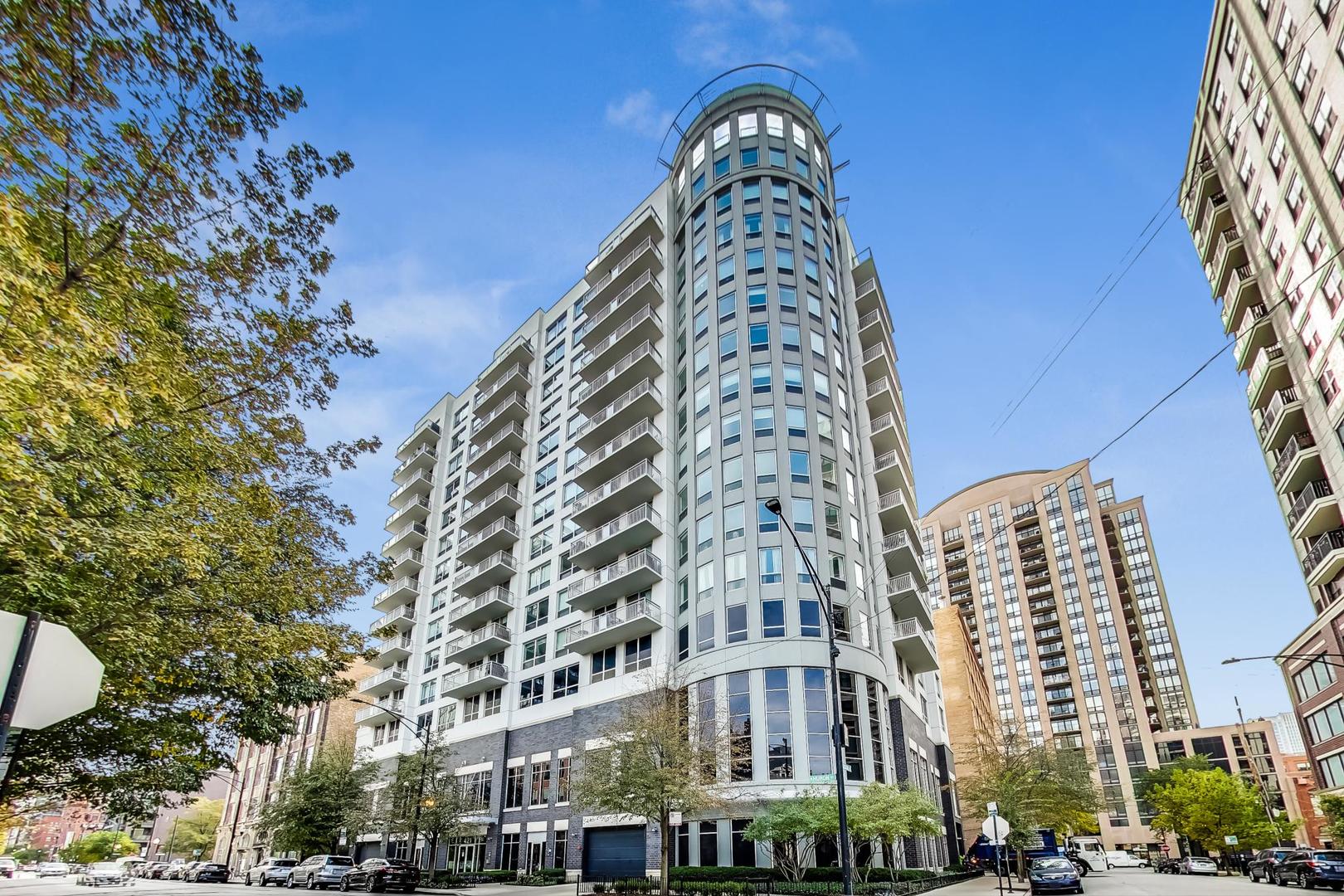 421 West Huron Street, Unit 604 Chicago, IL 60654 - Photo 1 of 29 a view of a tall building