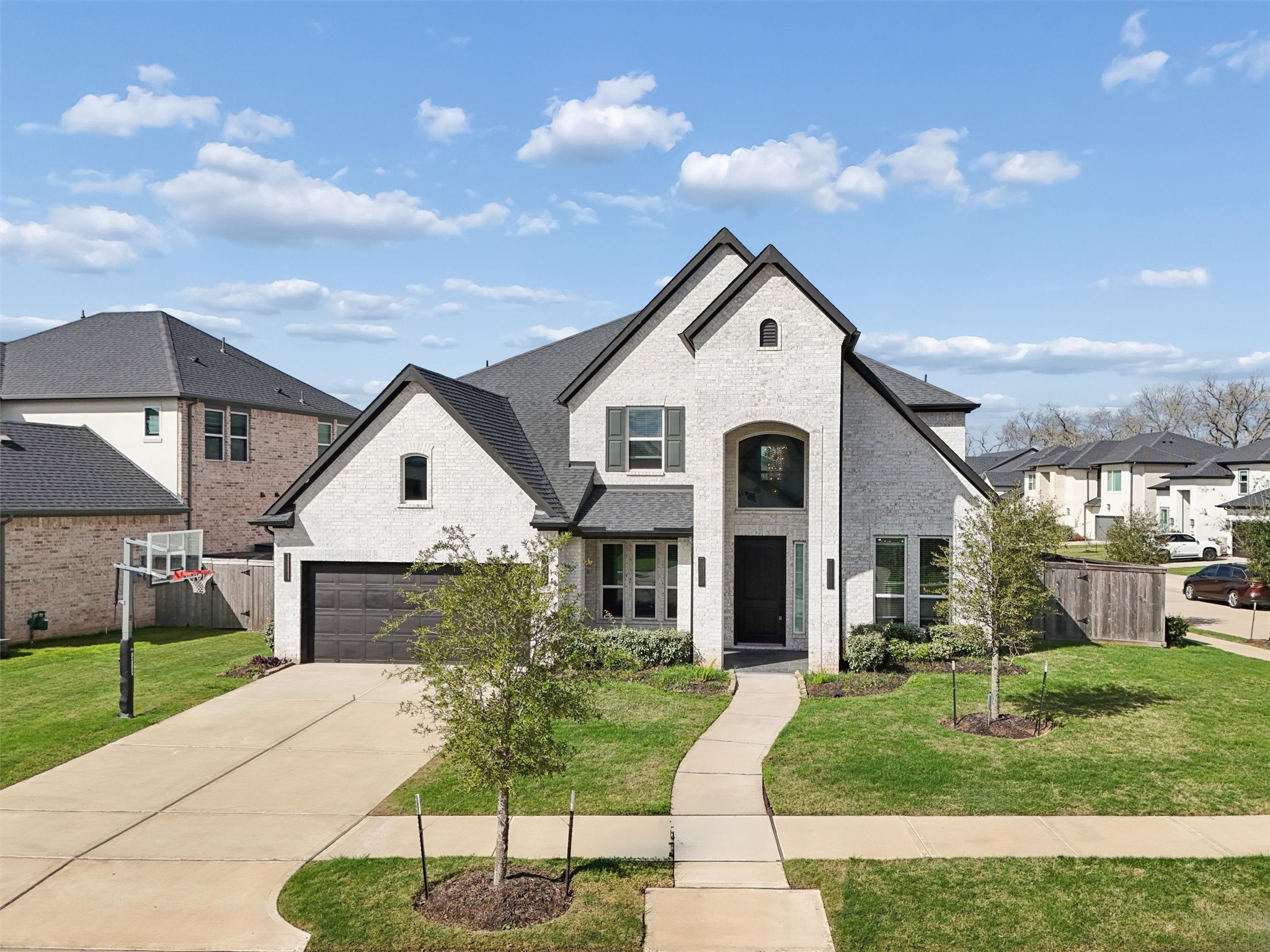 4710 Pecos Ridge Lane Sugar Land, TX 77479 - Photo 3 of 49 Corner lot with new landscaped mulch bed and prepared garden in the back , Extended front patio, basketball goal