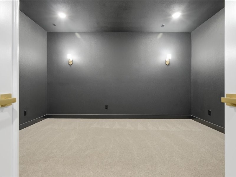 4710 Pecos Ridge Lane Sugar Land, TX 77479 - Photo 40 of 49 Media Room with 10.2 pro wire setup hi end carpet
