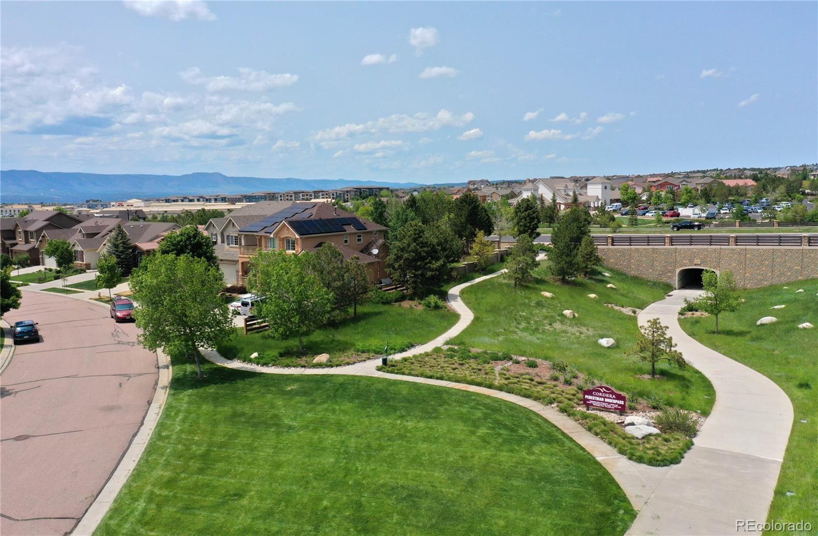 4970 Rabbit Mountain Court Colorado Springs, CO 80924 - Photo 46 of 50 a view of a lake with a yard