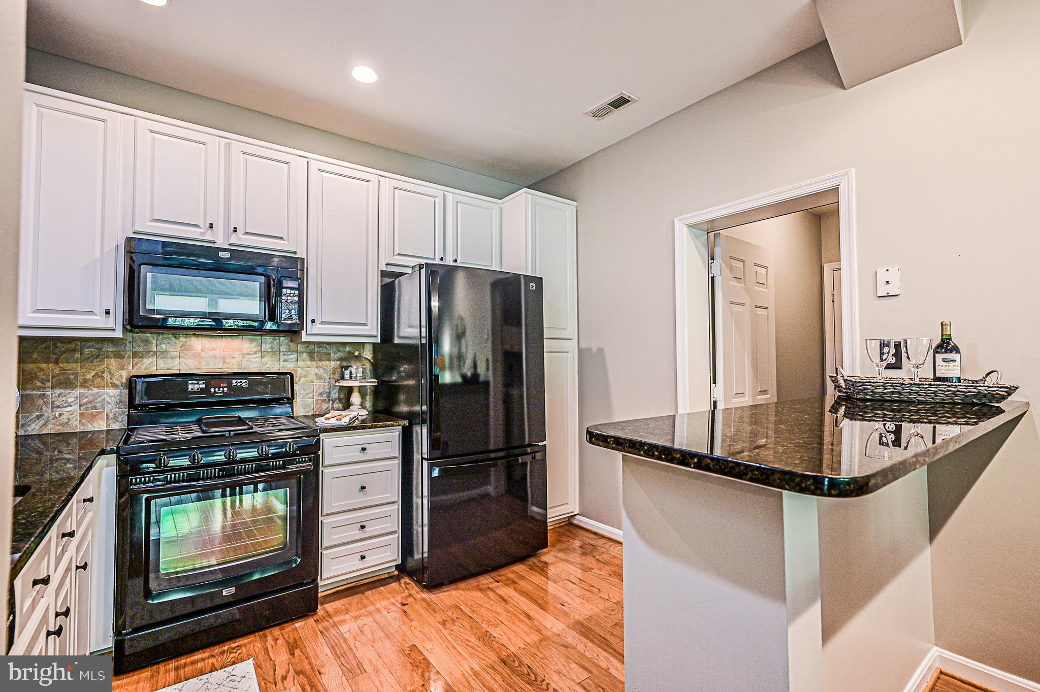 11405 Windleaf Court, Unit B Reston, VA 20194 - Photo 13 of 32 Counter bar space