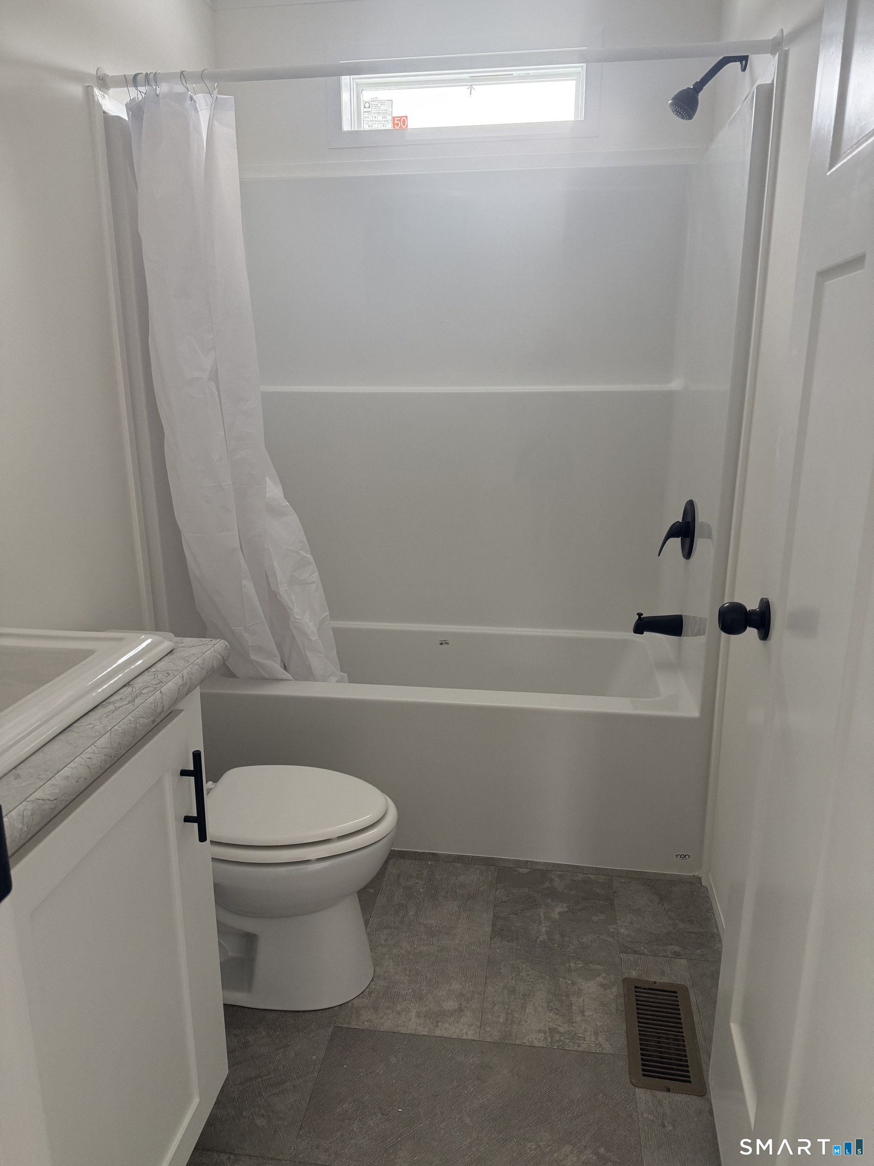 11-421 Norwich-Westerly Road North Stonington, CT 06359 - Photo 9 of 10 a bathroom with a toilet and a shower