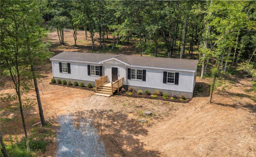 9374 High Point Road Villa Rica, GA 30180 - Photo 3 of 13 front view of a house with a yard