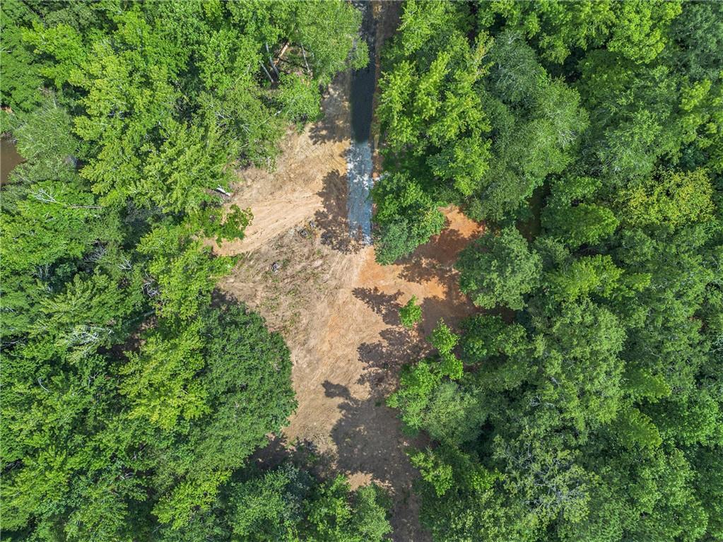9374 High Point Road Villa Rica, GA 30180 - Photo 5 of 13 a backyard of a house with a yard and outdoor seating