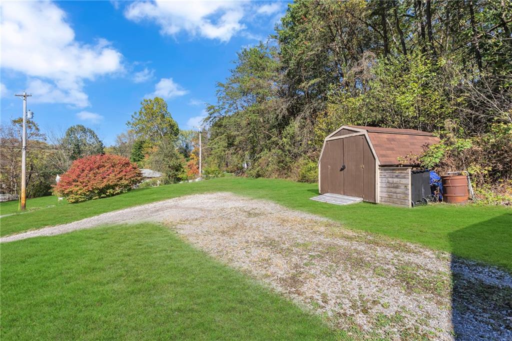 584 Chapel Road Aliquippa, PA 15001 - Photo 31 of 33 Additional parking and a storage shed to house all of your outdoor equipment.