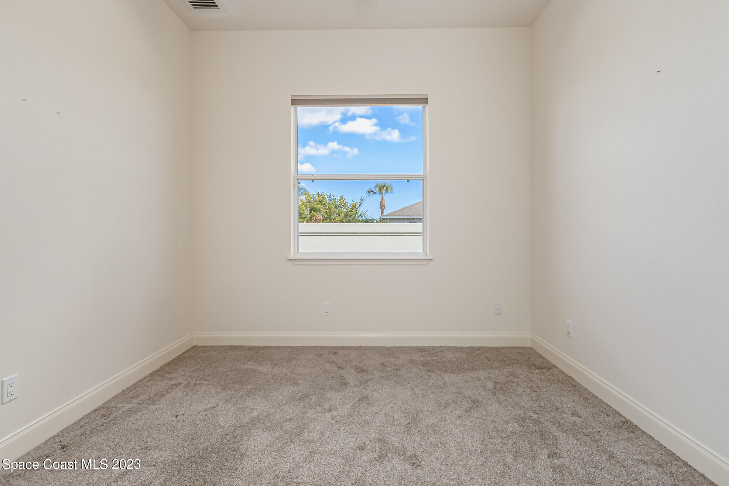 4100 Alamanda Key Drive Melbourne, FL 32901 - Photo 21 of 73 an empty room with a window