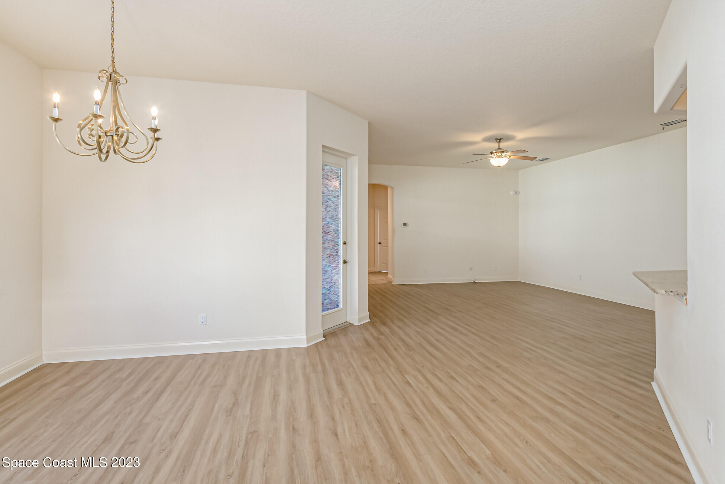 4100 Alamanda Key Drive Melbourne, FL 32901 - Photo 27 of 73 a view of empty room with wooden floor