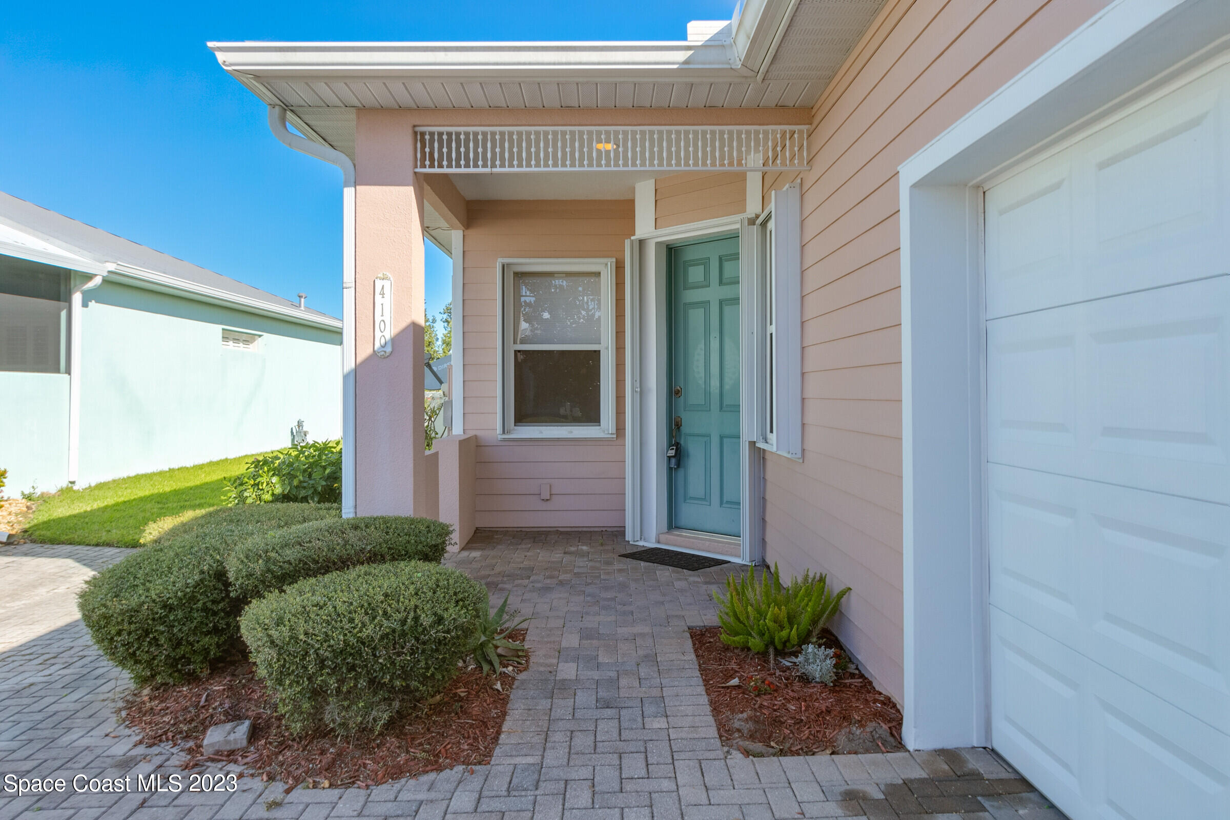 4100 Alamanda Key Drive Melbourne, FL 32901 - Photo 31 of 73 a front view of a house with garden