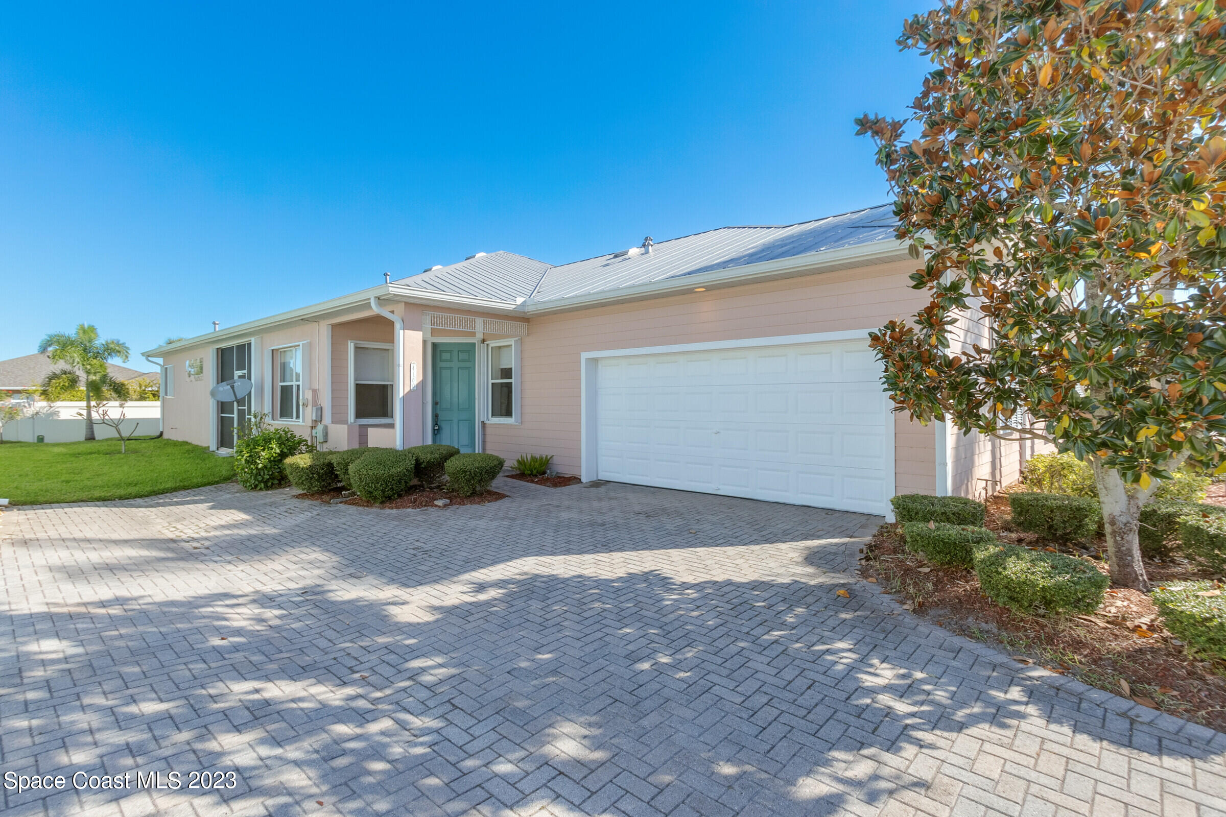 4100 Alamanda Key Drive Melbourne, FL 32901 - Photo 4 of 73 a view of backyard of a house