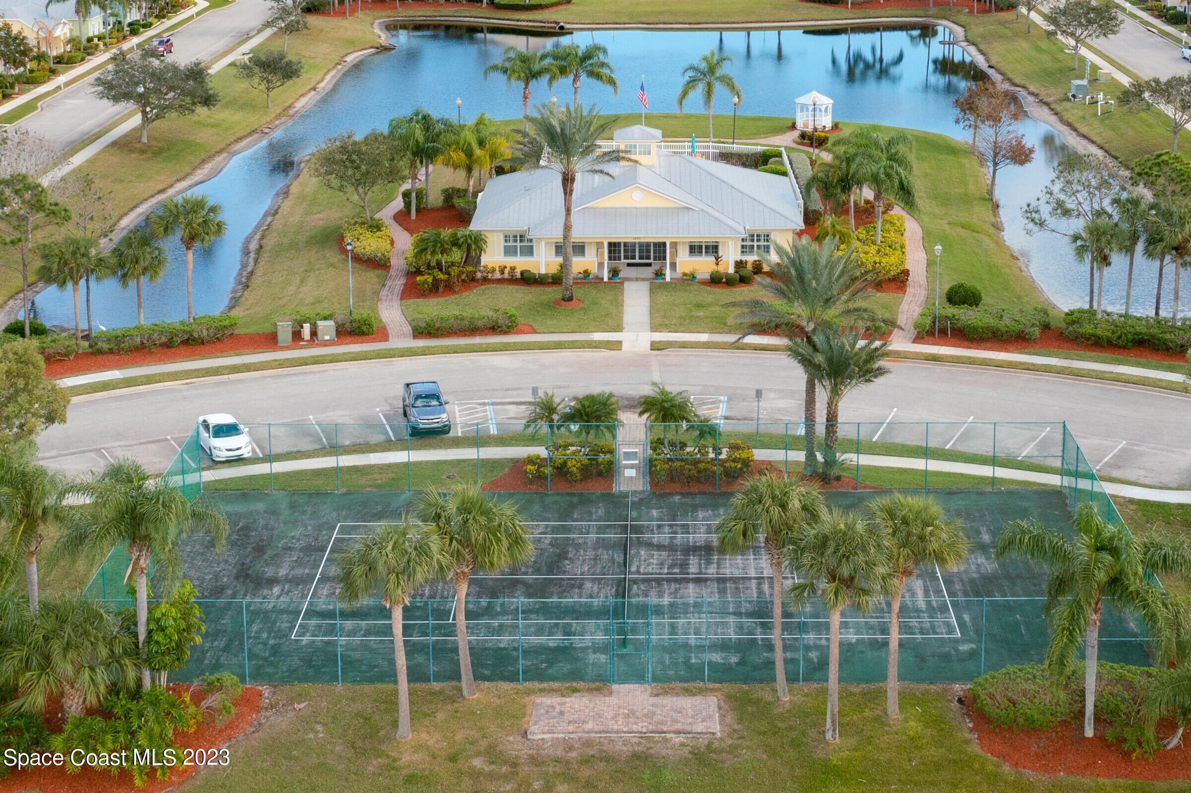 4100 Alamanda Key Drive Melbourne, FL 32901 - Photo 46 of 73 a view of a swimming pool with a yard