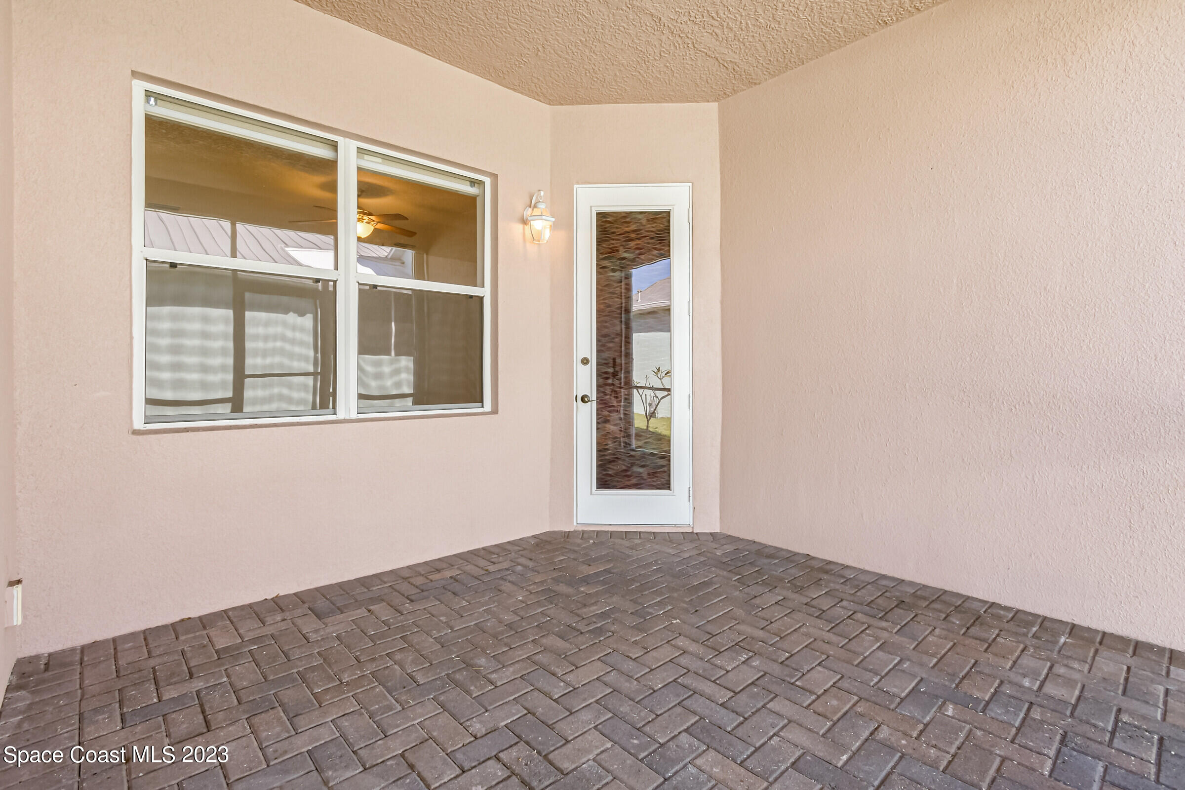 4100 Alamanda Key Drive Melbourne, FL 32901 - Photo 6 of 73 a view of empty room with windows