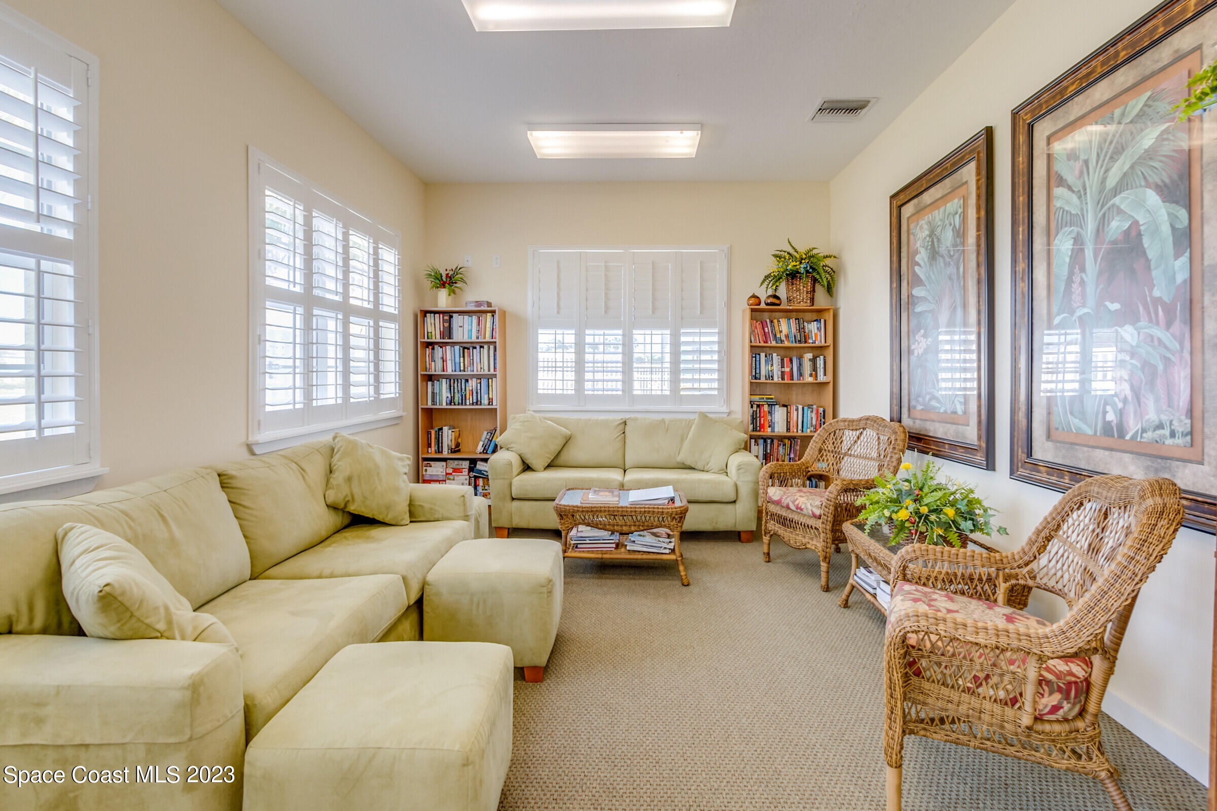 4100 Alamanda Key Drive Melbourne, FL 32901 - Photo 67 of 73 a living room with furniture and a large window