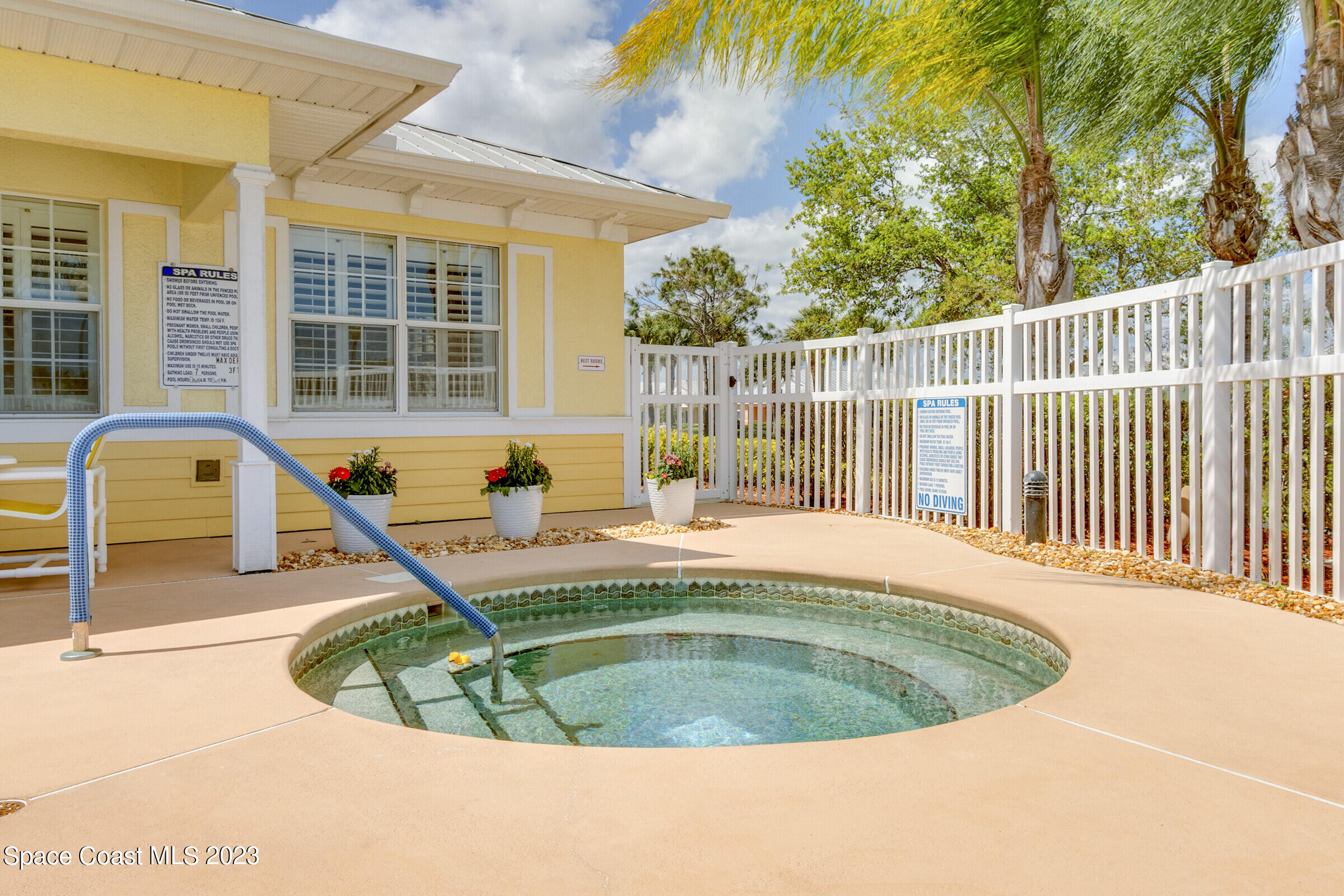 4100 Alamanda Key Drive Melbourne, FL 32901 - Photo 72 of 73 a view of a house with swimming pool and sitting area