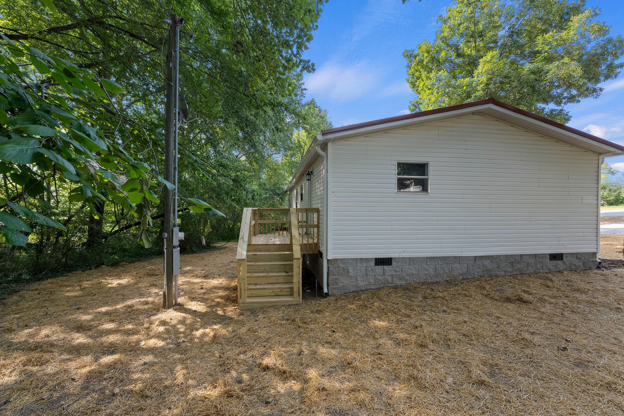 148 Glenburg Drive Manchester, TN 37355 - Photo 11 of 36 a backyard of a house