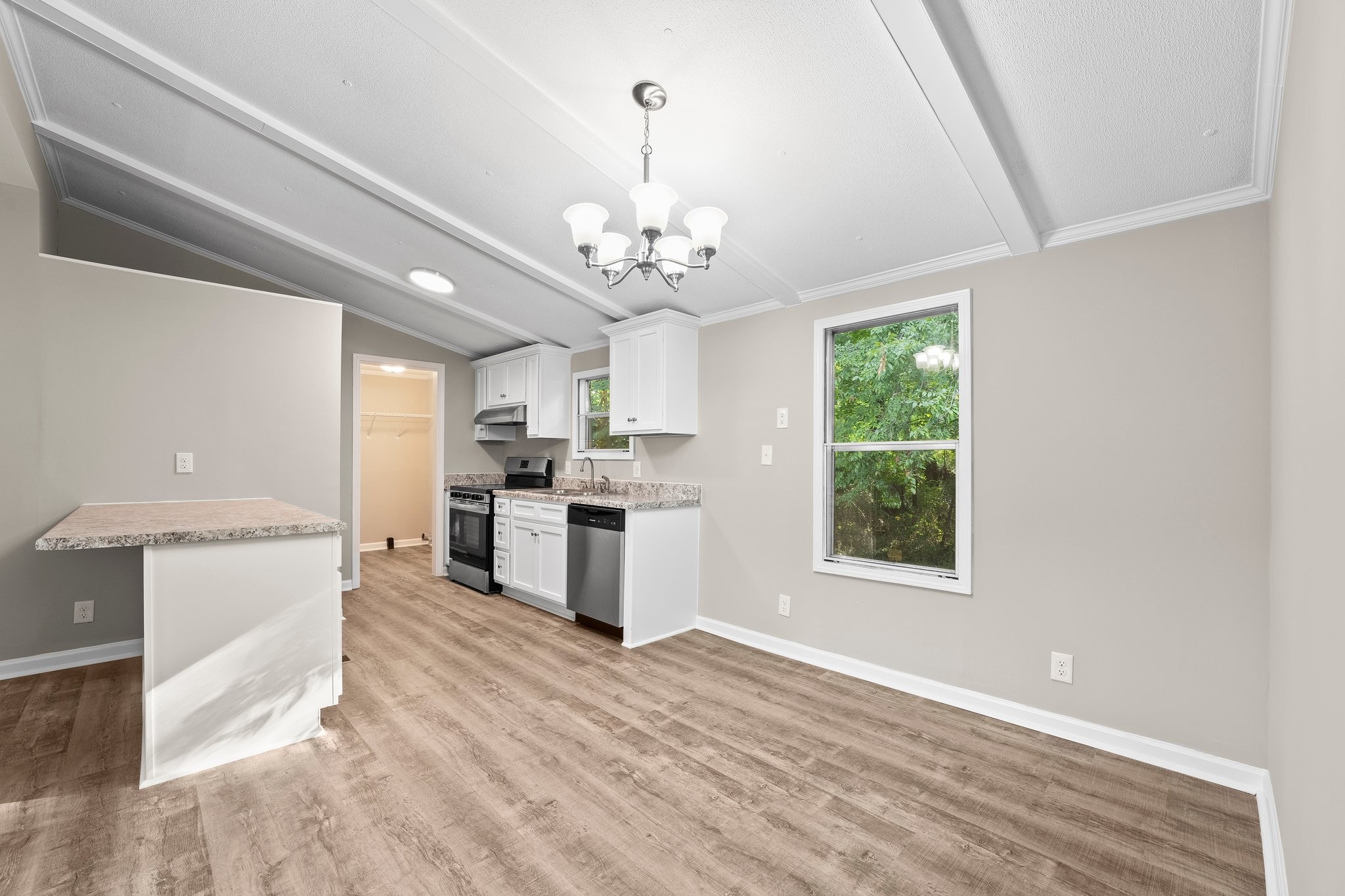 148 Glenburg Drive Manchester, TN 37355 - Photo 16 of 36 a view of a kitchen with granite countertop a window