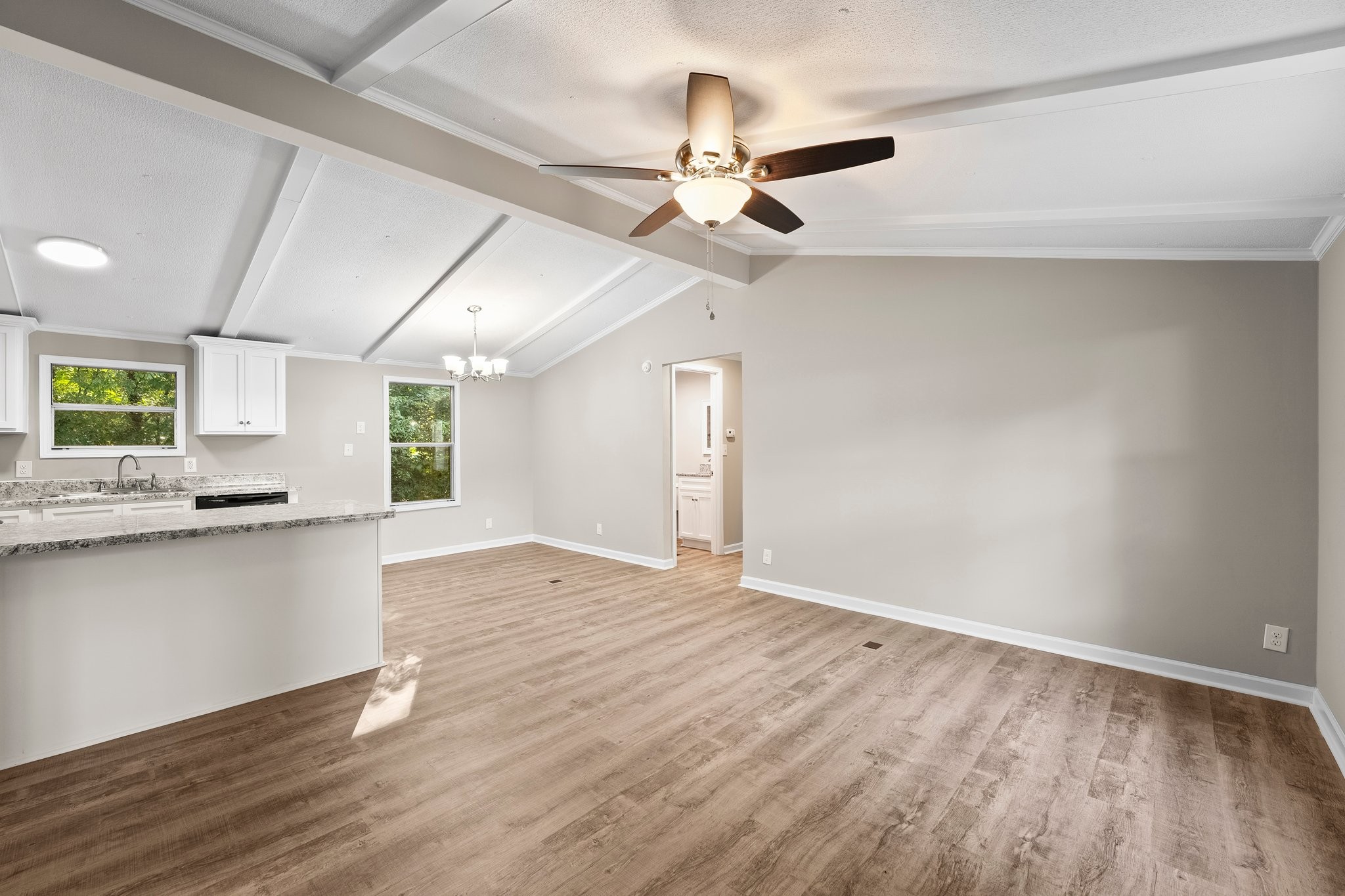 148 Glenburg Drive Manchester, TN 37355 - Photo 20 of 36 a view of a kitchen with a dishwasher cabinets and wooden floor
