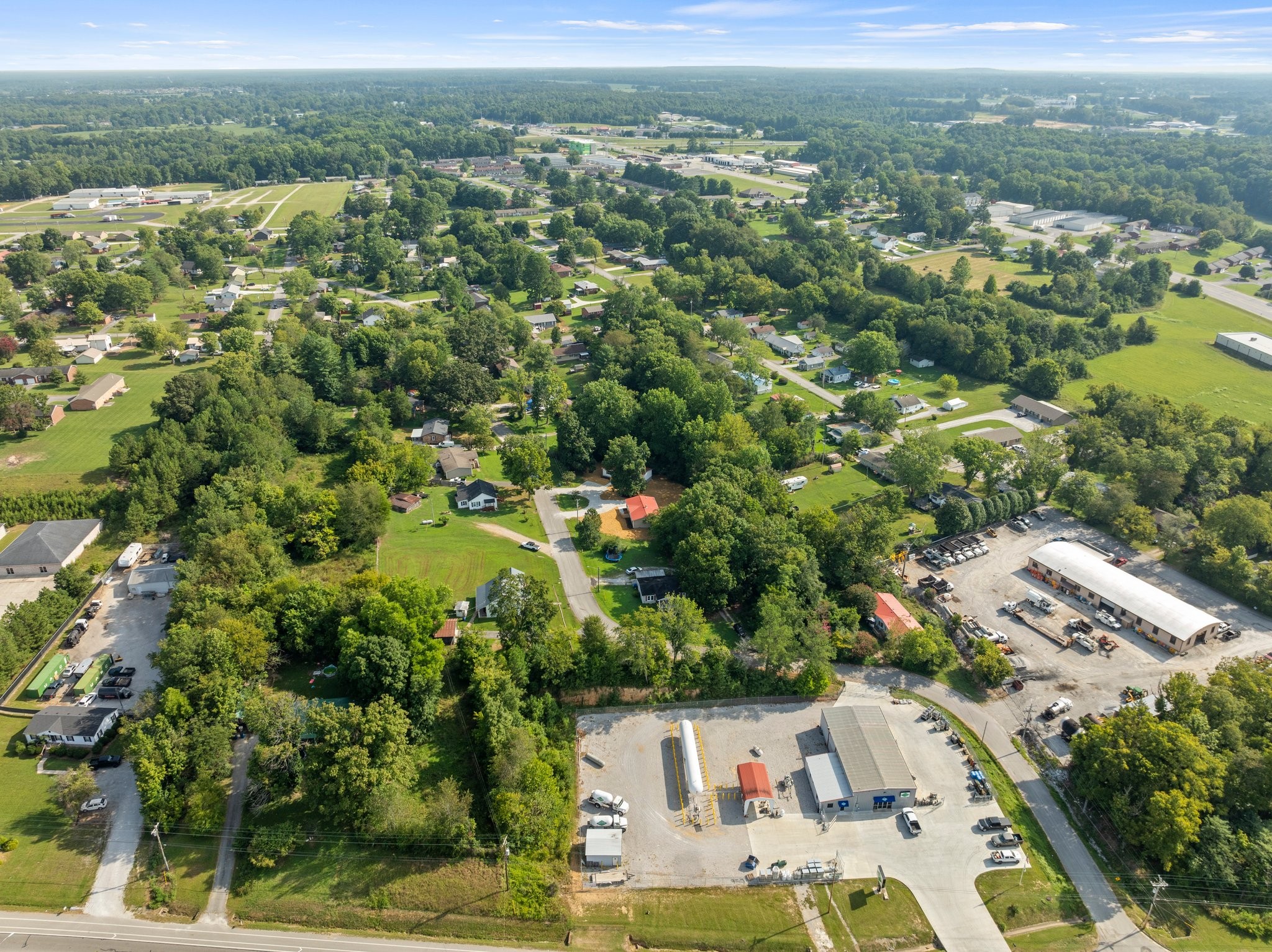 148 Glenburg Drive Manchester, TN 37355 - Photo 34 of 36 an aerial view of residential houses with outdoor space and trees