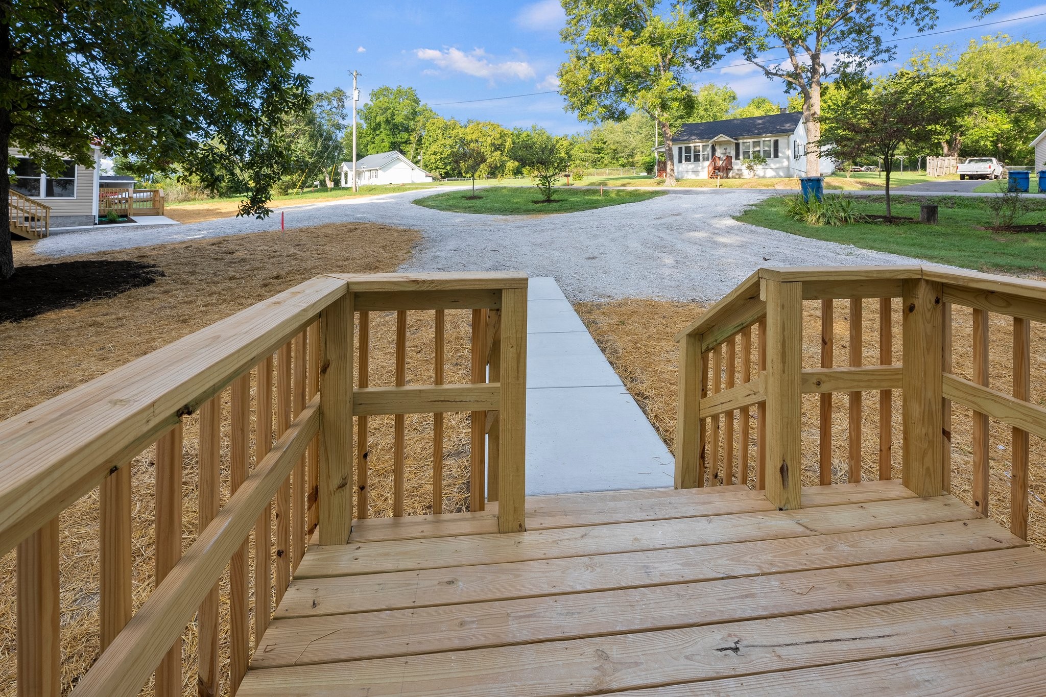 148 Glenburg Drive Manchester, TN 37355 - Photo 6 of 36 a view of a house with a yard and large trees