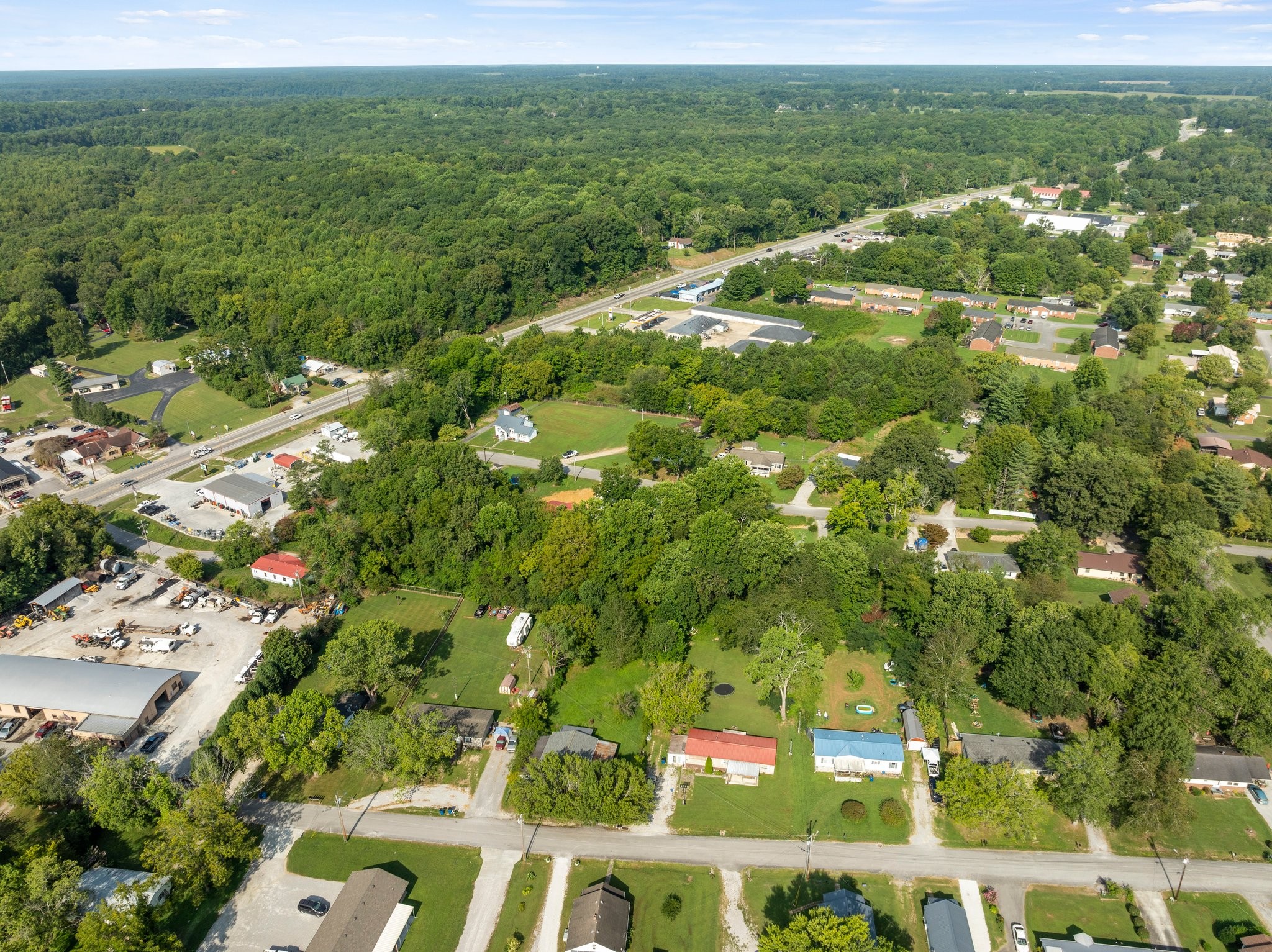 148 Glenburg Drive Manchester, TN 37355 - Photo 9 of 36 a view of a city with lush green forest