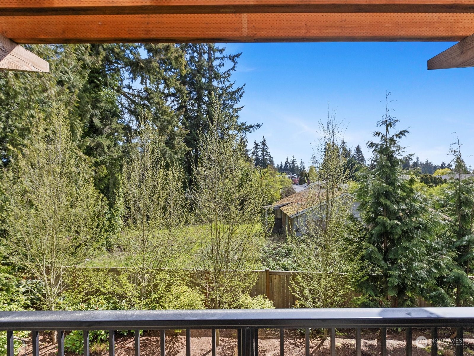 19225 Damson Road, Unit R2 Lynnwood, WA 98036 - Photo 36 of 37 a view of a yard from a balcony