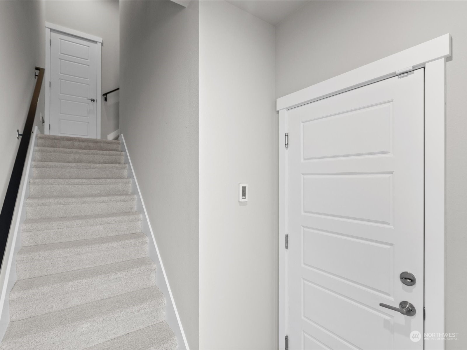 19225 Damson Road, Unit R2 Lynnwood, WA 98036 - Photo 4 of 37 a view of staircase with white walls