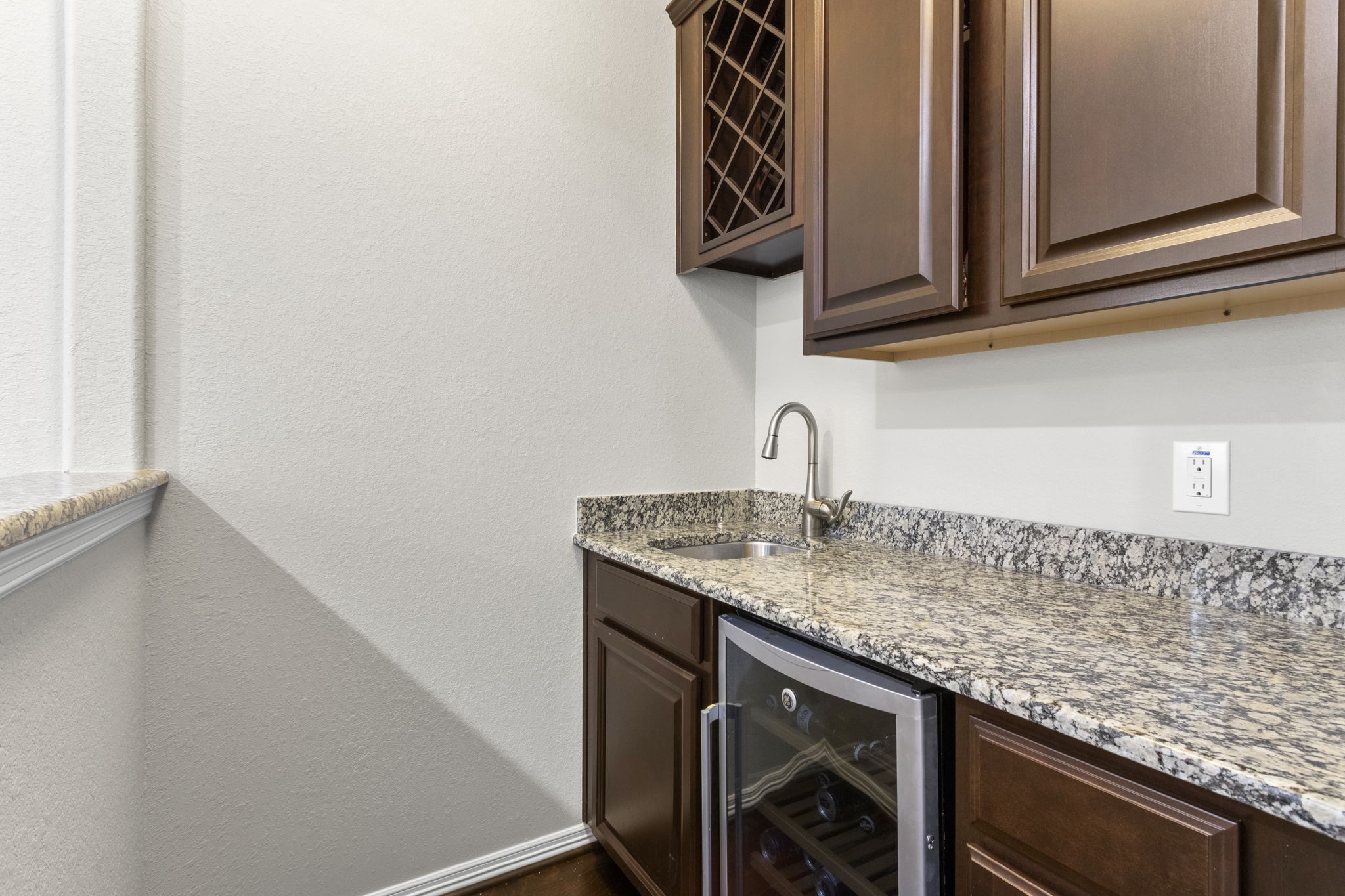 23211 Belted Kingfisher Trail Spring, TX 77389 - Photo 30 of 47 Wet bar has a convenient beverage fridge