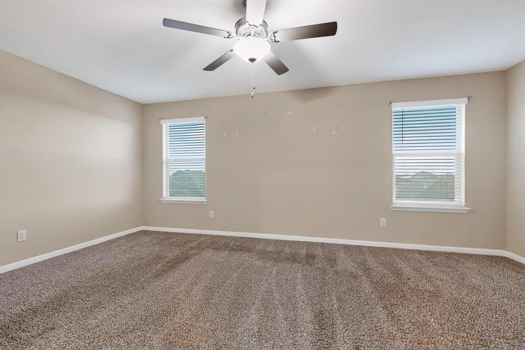 305 Honeysuckle Lane Princeton, TX 75407 - Photo 23 of 39 a view of an empty room with a window
