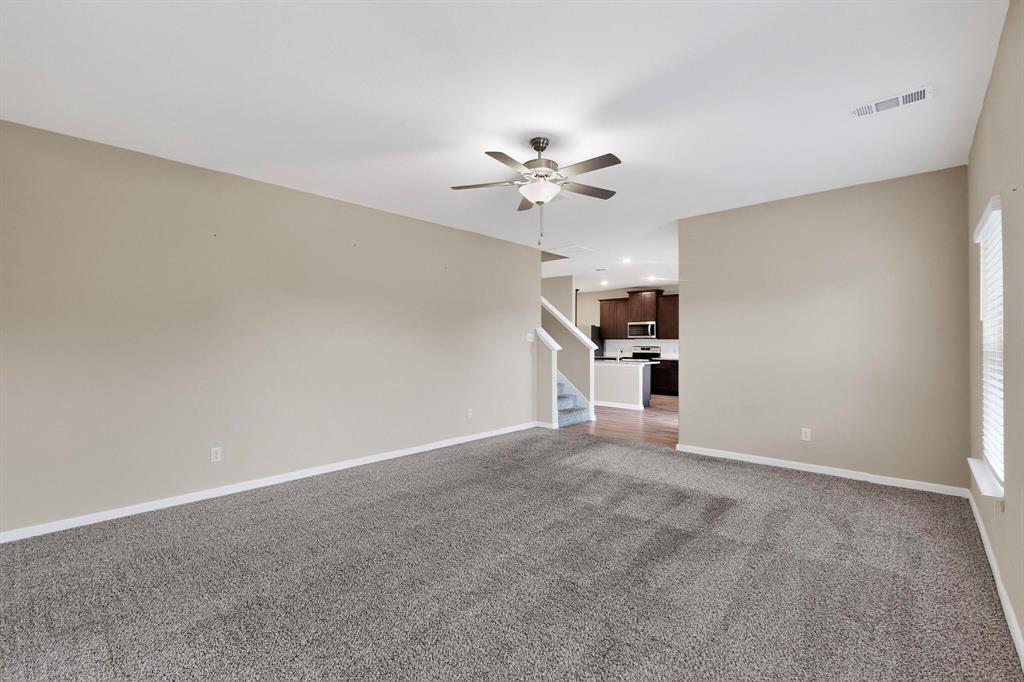 305 Honeysuckle Lane Princeton, TX 75407 - Photo 10 of 39 a view of an empty room with a window
