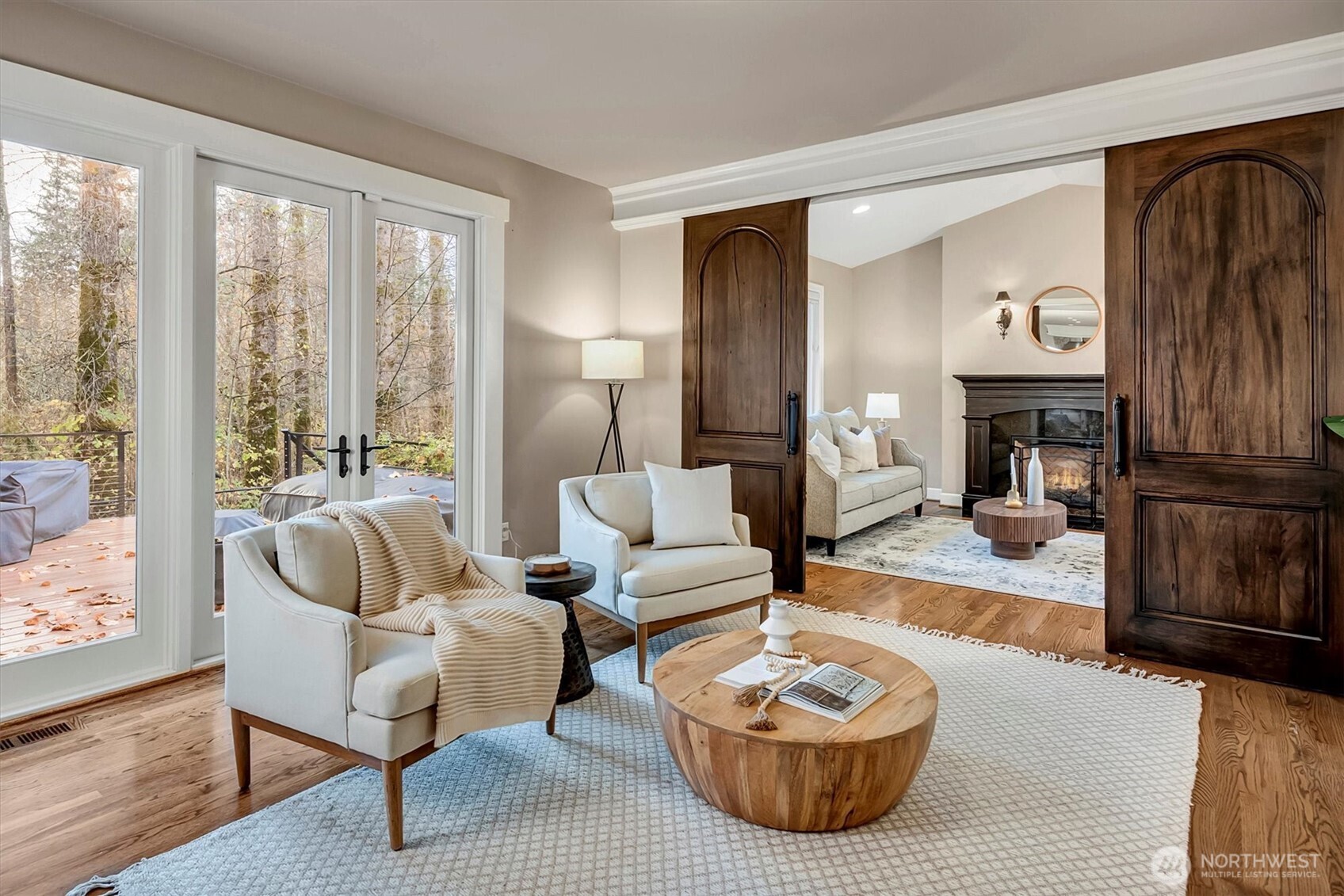 2016 236th Avenue Southeast Sammamish, WA 98075 - Photo 12 of 25 a living room with furniture and a fireplace