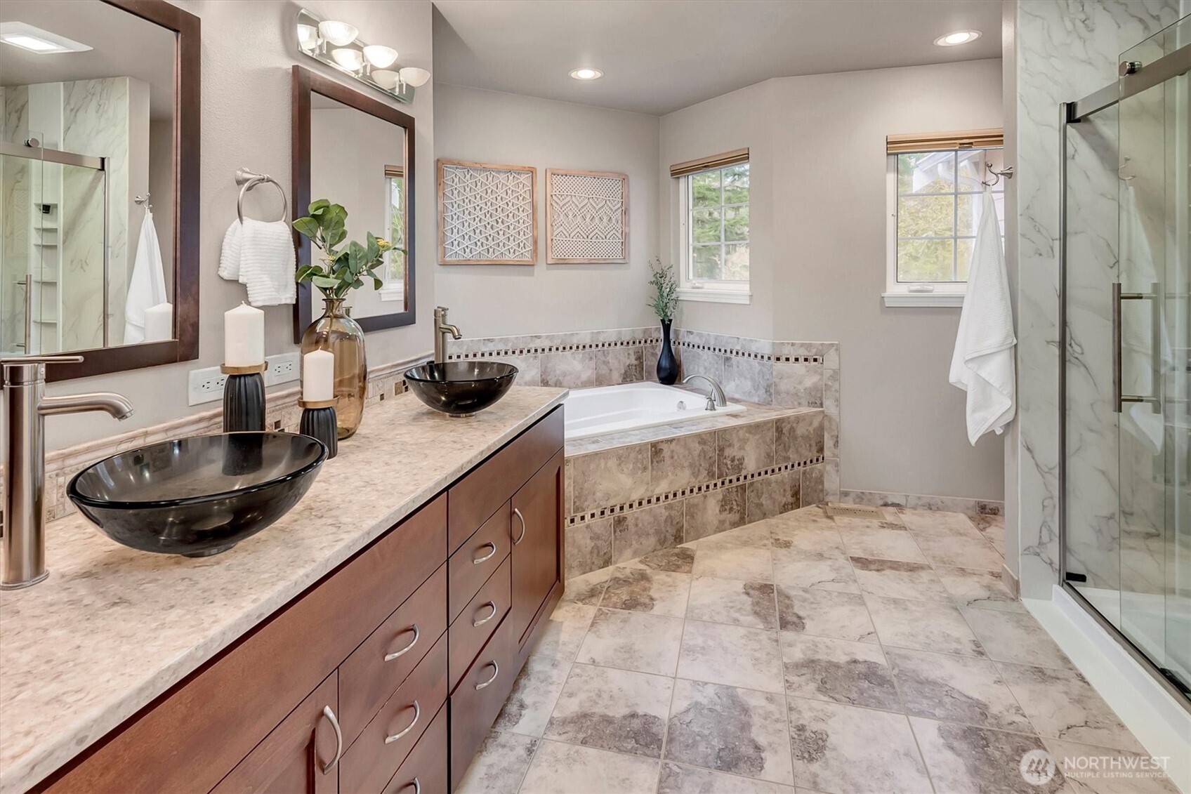 2016 236th Avenue Southeast Sammamish, WA 98075 - Photo 16 of 25 a bathroom with a granite countertop sink a toilet a mirror and shower