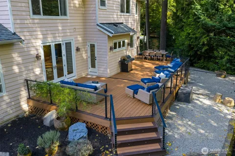 a view of a chairs and table in the patio