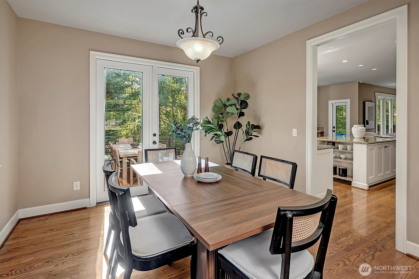 2016 236th Avenue Southeast Sammamish, WA 98075 - Photo 5 of 25 a view of a dining room with furniture window and wooden floor