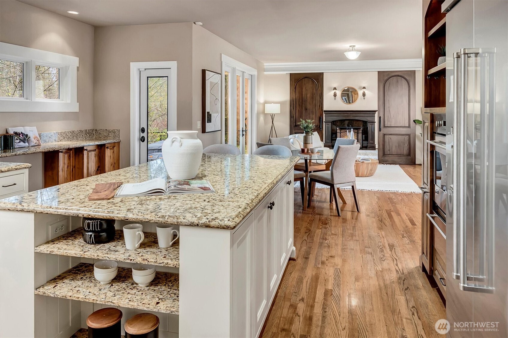 2016 236th Avenue Southeast Sammamish, WA 98075 - Photo 8 of 25 a living room with furniture and a fireplace