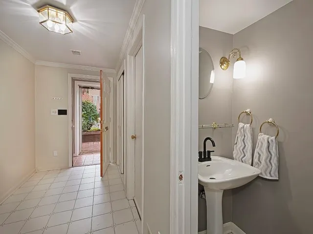 a view of a hallway with washer and dryer