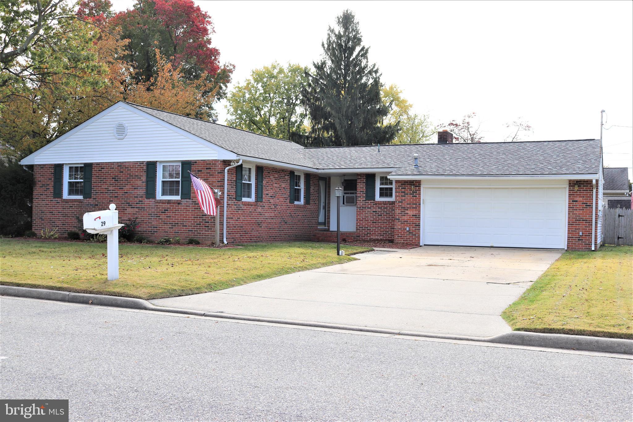 29 Georgia Road Pennsville, NJ 08070 - Photo 1 of 29 a front view of house with yard and trees around