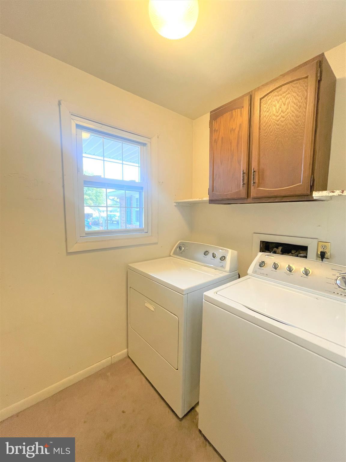 29 Georgia Road Pennsville, NJ 08070 - Photo 26 of 29 a view of storage and utility room with washer and dryer