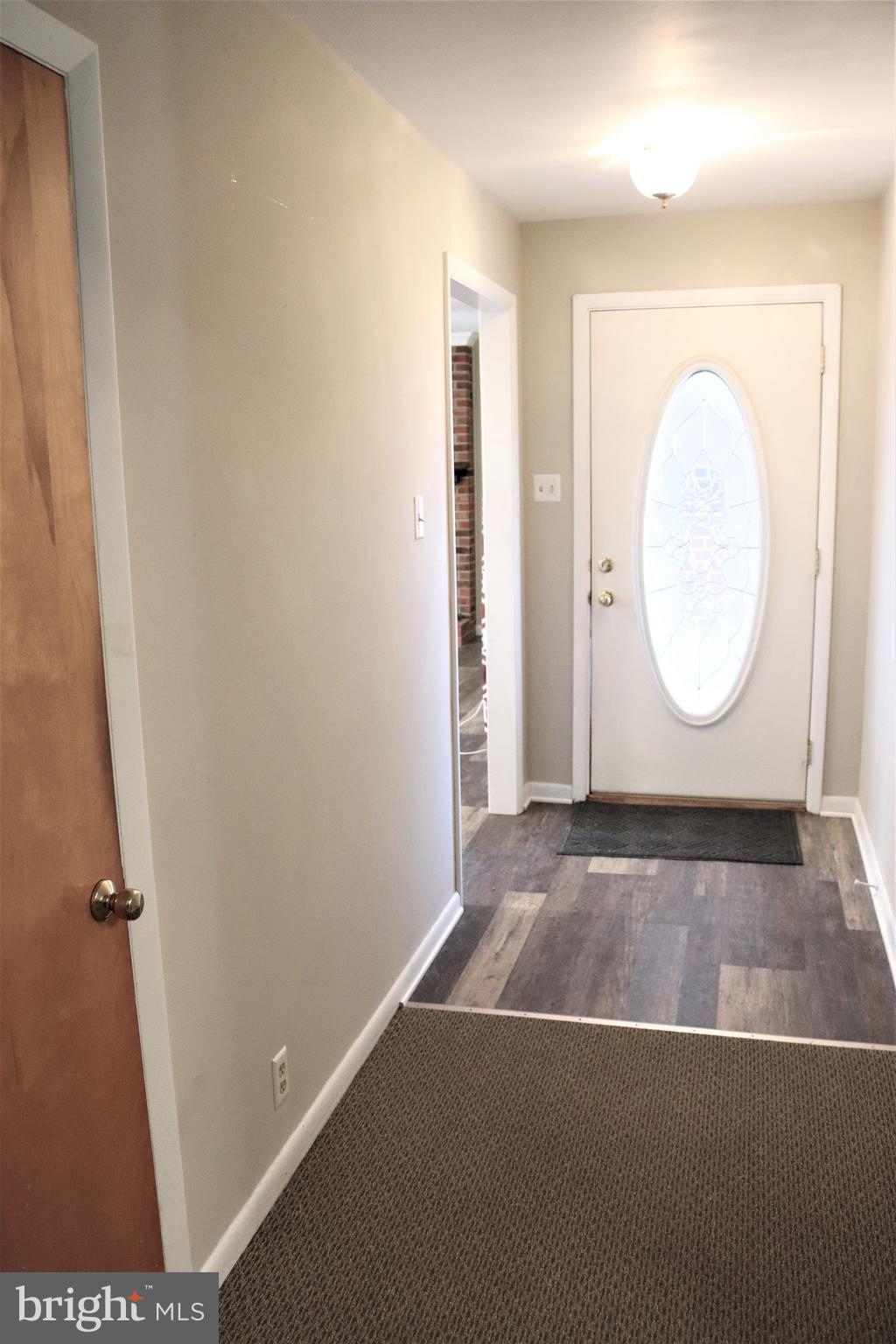 29 Georgia Road Pennsville, NJ 08070 - Photo 6 of 29 a view of a room with wooden floor and white walls