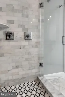 a view of a hallway with washer and dryer