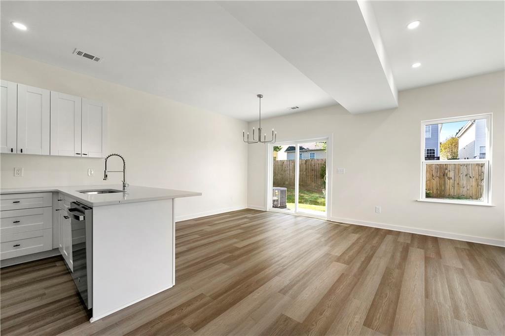 3605 Brycewood Drive Decatur, GA 30034 - Photo 3 of 15 a kitchen with wooden floors and sink