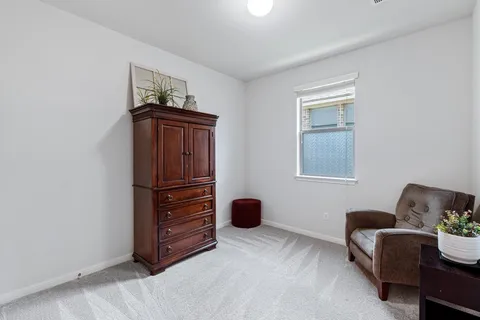 a view of workspace with a couch