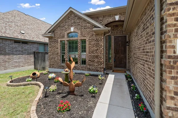 a front view of a house with patio