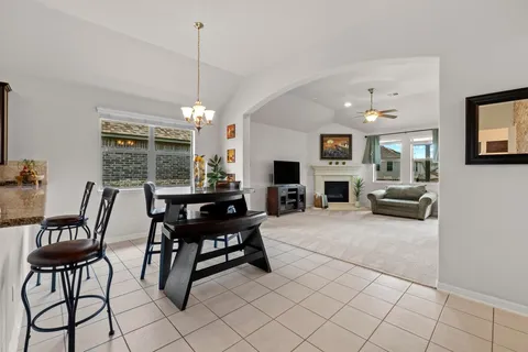 a view of a livingroom with furniture window and wooden floor