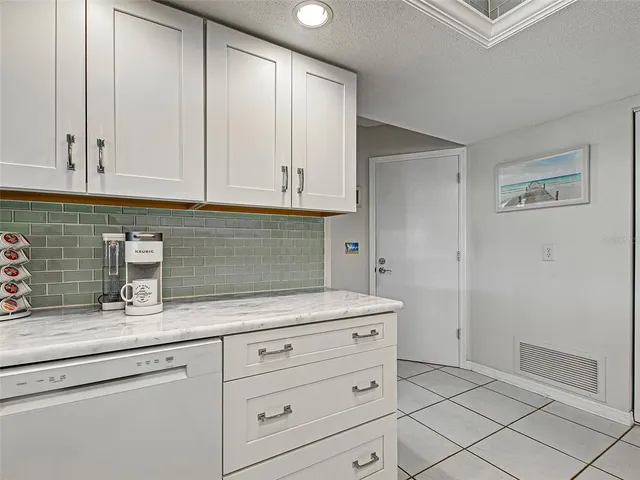 a bedroom with a bed and a walk in closet