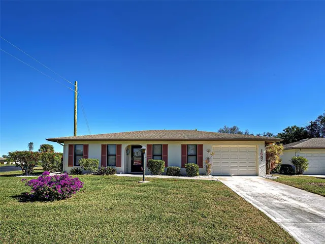 a front view of a house with a porch