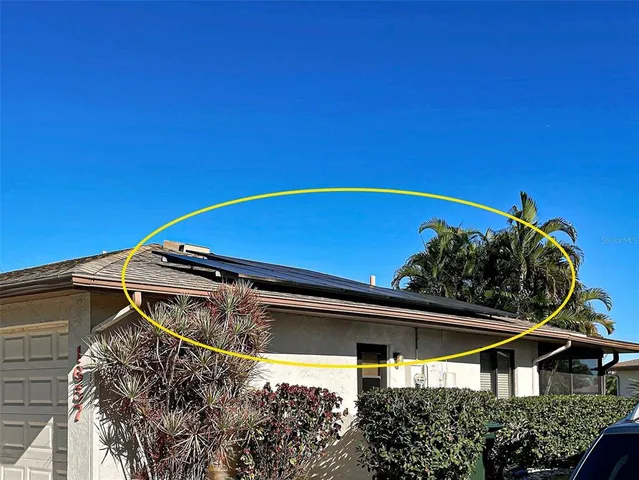 a house view with a garden space