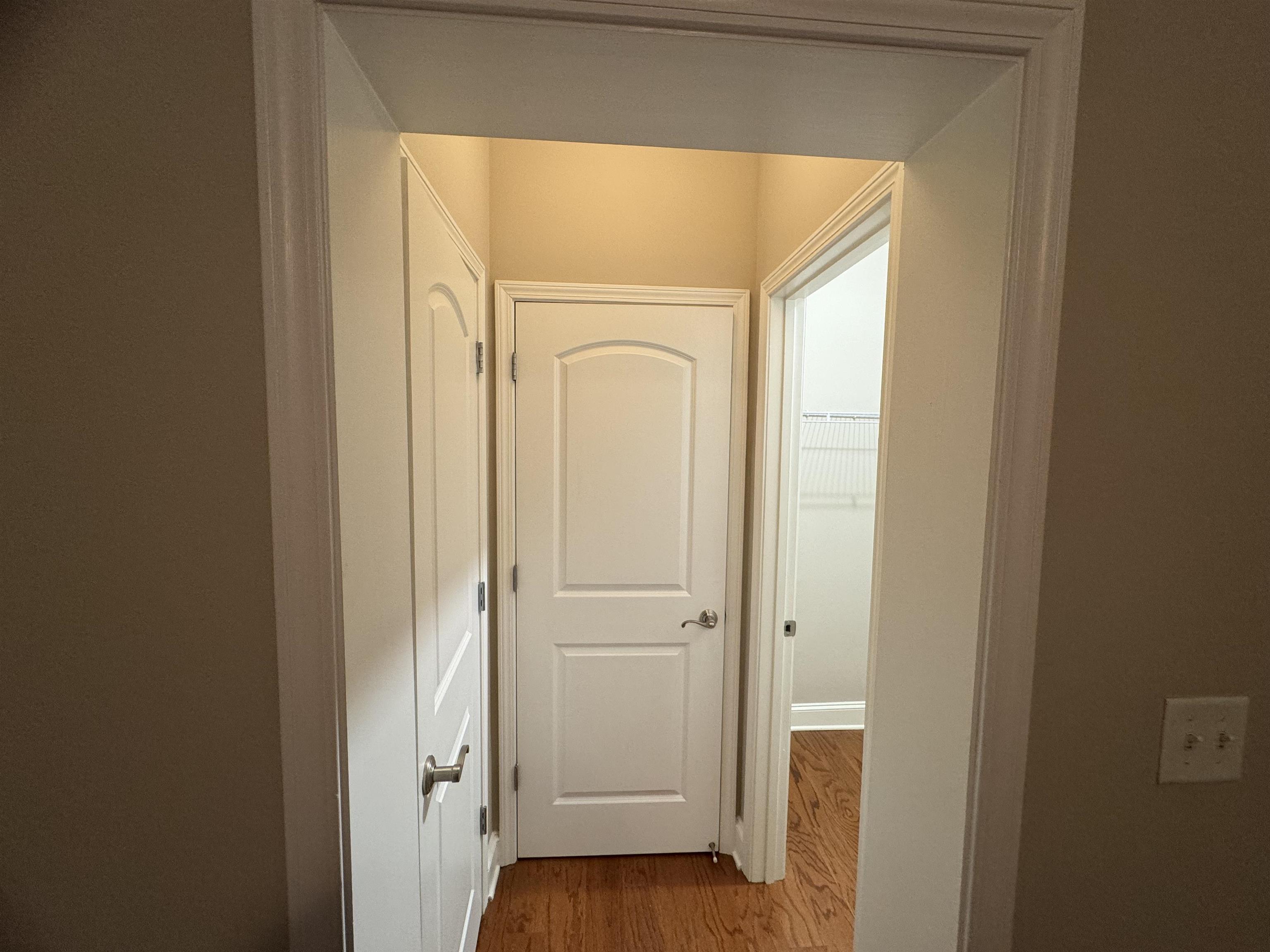 70 West Carolina Avenue, Unit 105 Memphis, TN 38103 - Photo 13 of 40 a view of a hallway with wooden floor