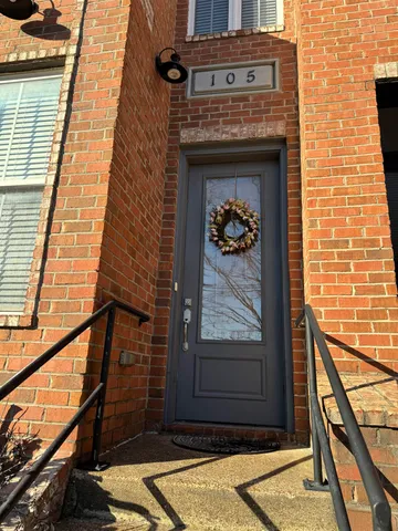 a front view of a house with a door