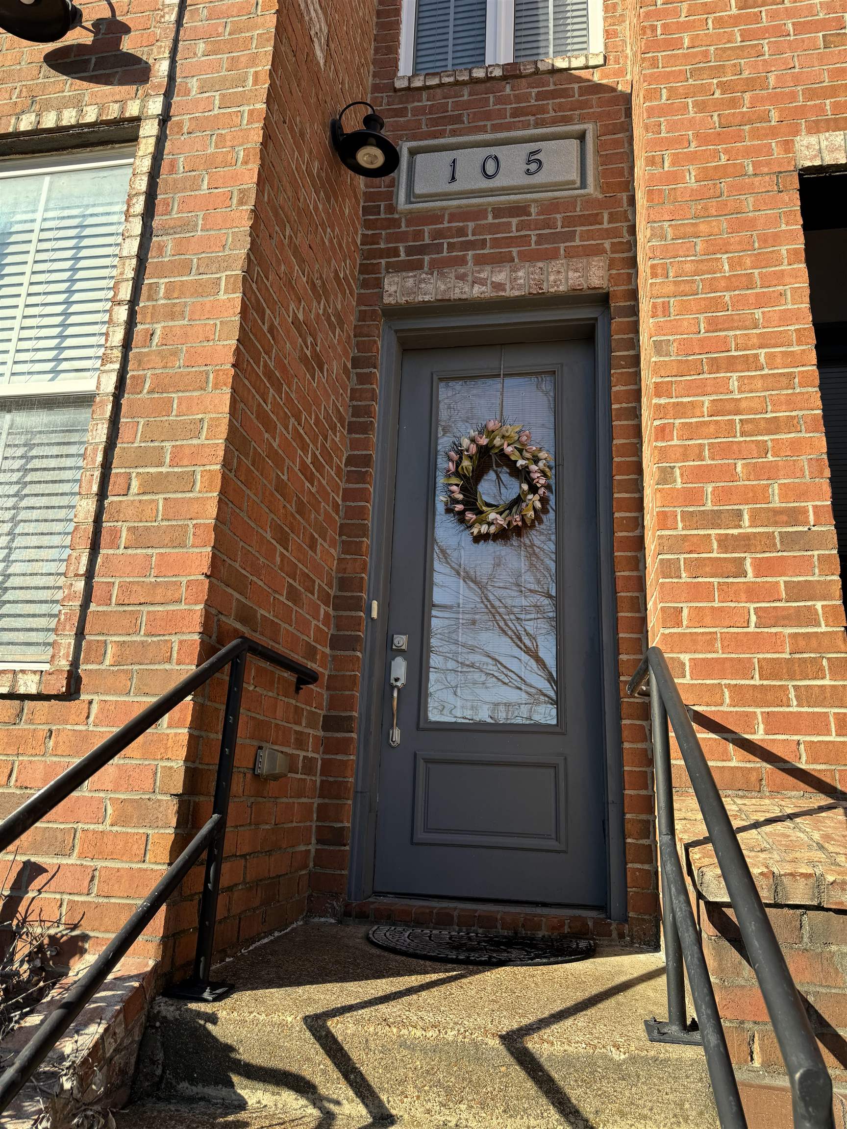 70 West Carolina Avenue, Unit 105 Memphis, TN 38103 - Photo 17 of 40 a front view of a house with a door